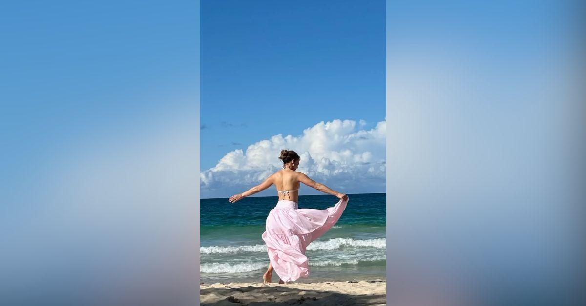 jlo twirls in bikini office romance wrap