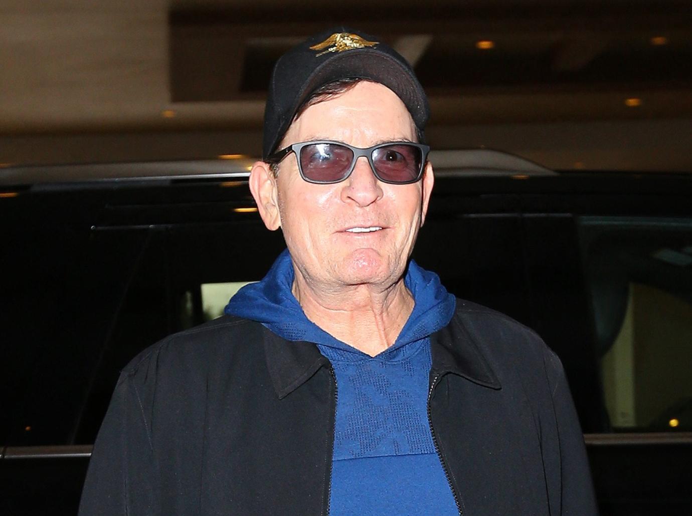 Charlie Sheen enjoys rare outing with his, Brooke Mueller's sons