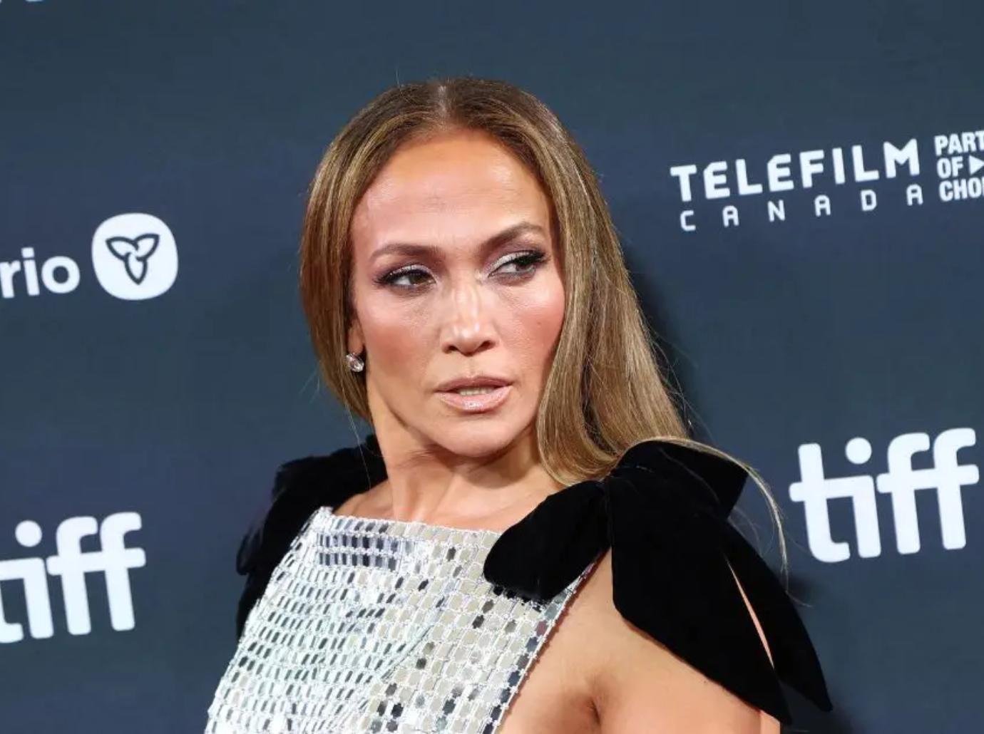 jennifer lopez ends autograph signing asked about sean diddy combs