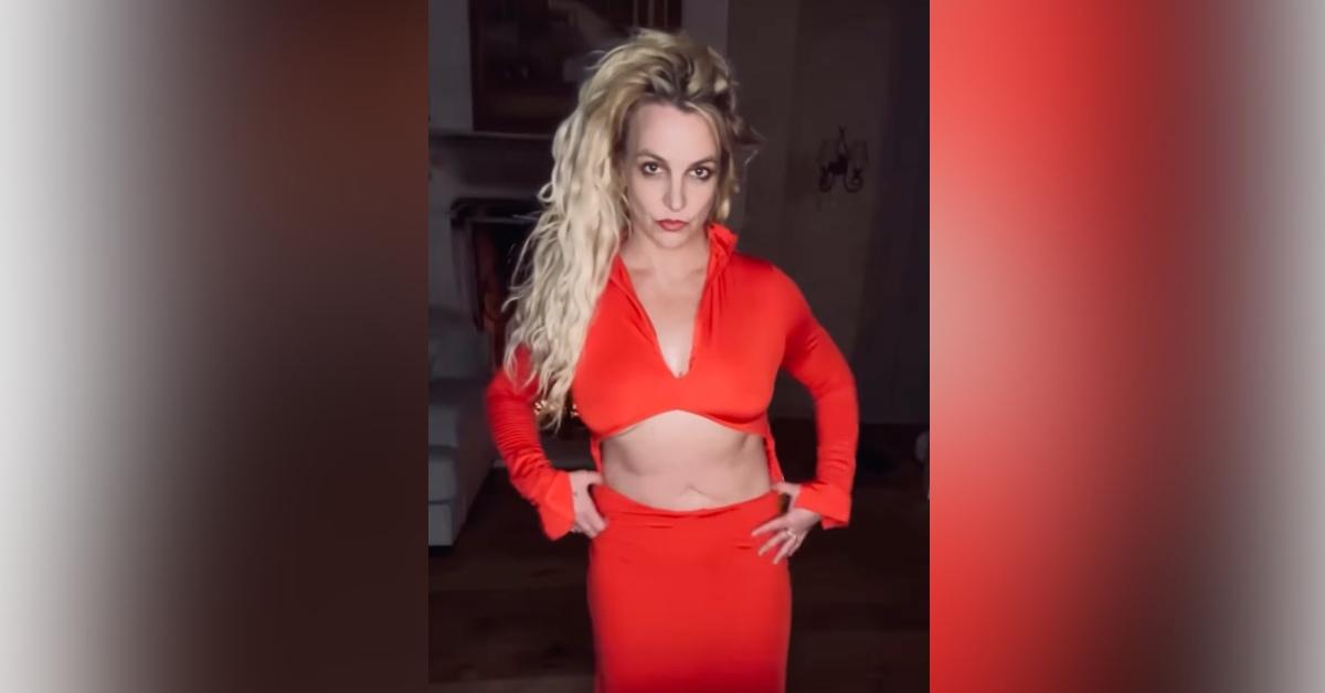 Britney Spears Pulls Down Her Red Cut-Out Dress Dangerously Low to Show Off Abs and Tattoos: Photos