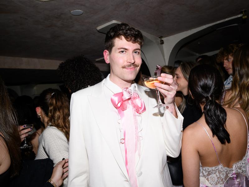 harry hill toasts loveshackfancys fall winter new york fashion week presentation with a glass of j vineyards winery sparkling brut rose