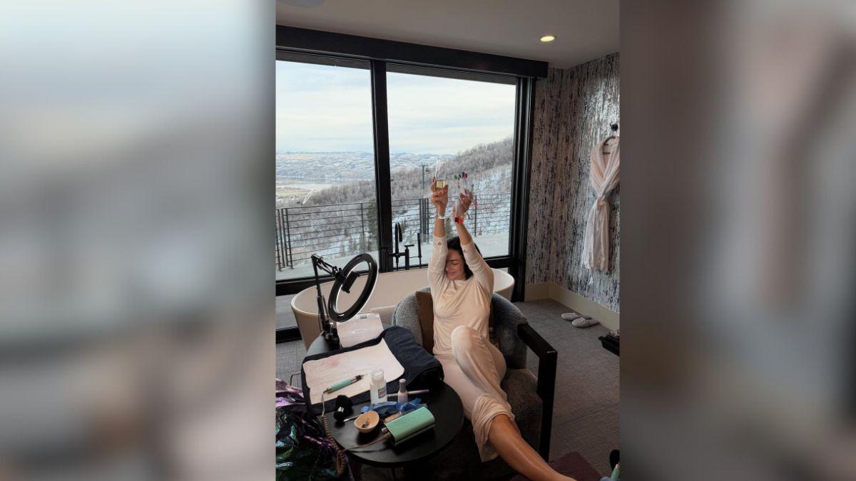 image of Charli XCX posed in a fur coat. 