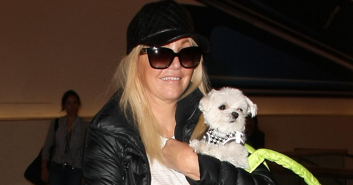 heather locklear spotted at airport with fiance chris heisser