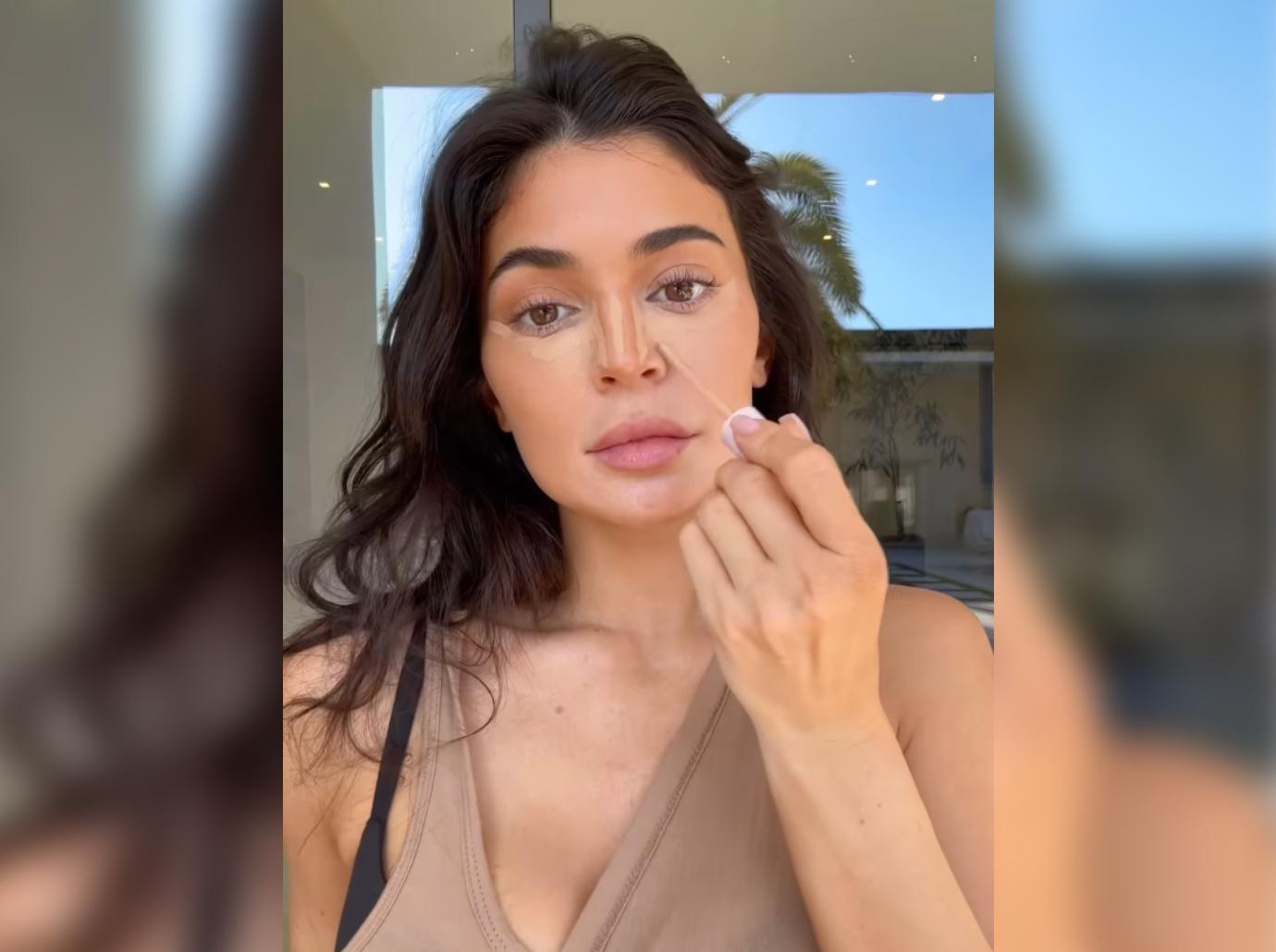 Kylie Jenner slammed for 'ridiculous' lips as star busts out of black bra  in sexy TikTok video