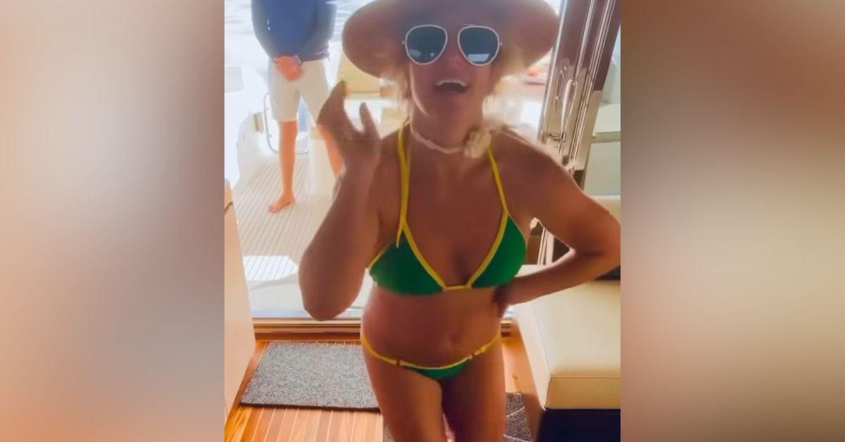 bikini clad britney spears touches herself dance on boat
