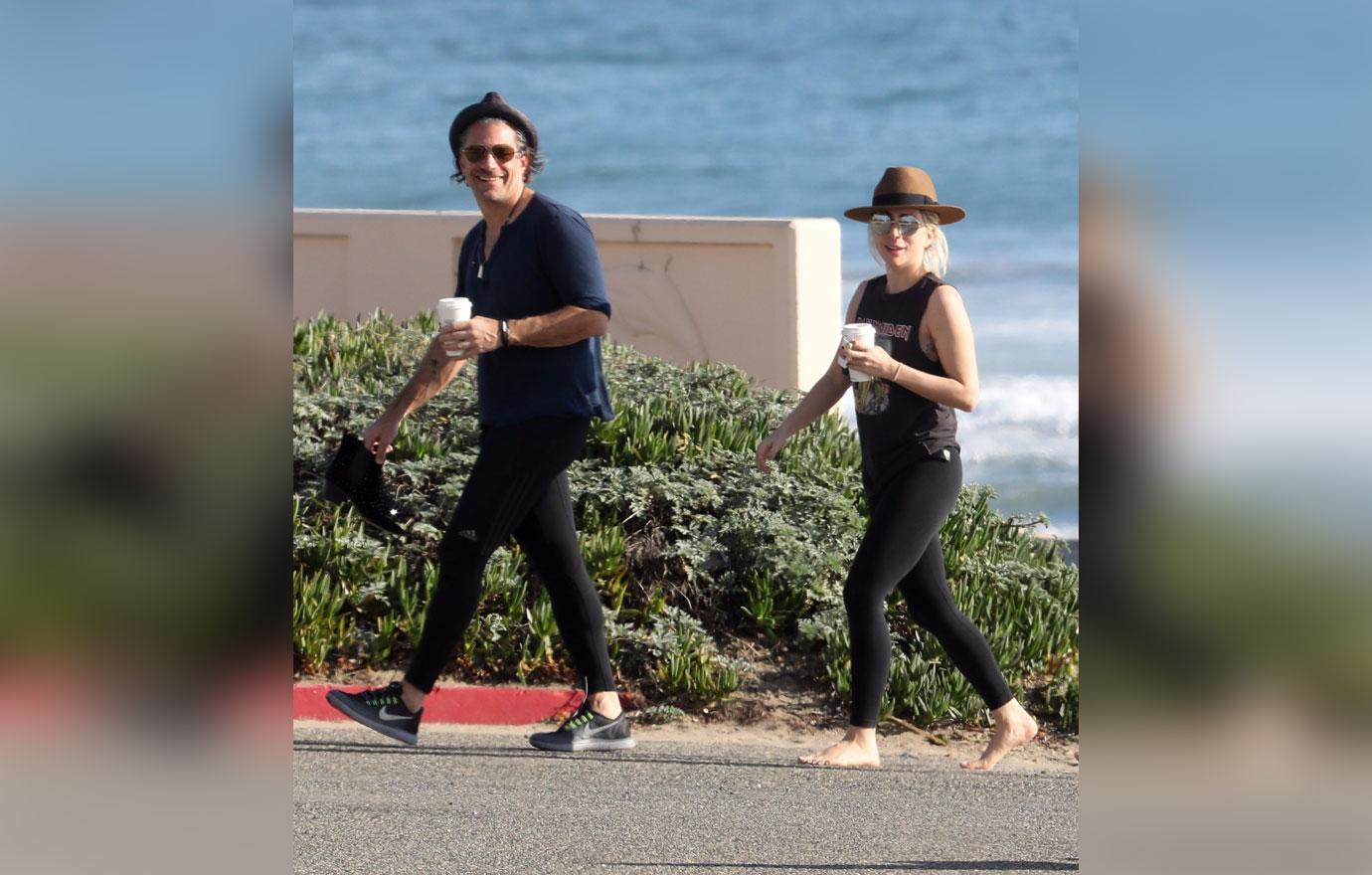 *EXCLUSIVE* Lady Gaga and beau Christian Carino share the PDA by the water!