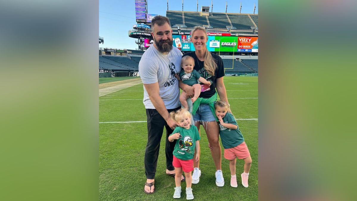 Photo of Jason and Kylie Kelce with their kids