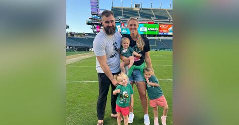Photo of Jason and Kylie Kelce with their kids