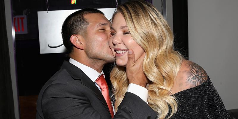 Javi Marroquin kissing his ex-wife Kailyn Lowry on the cheek