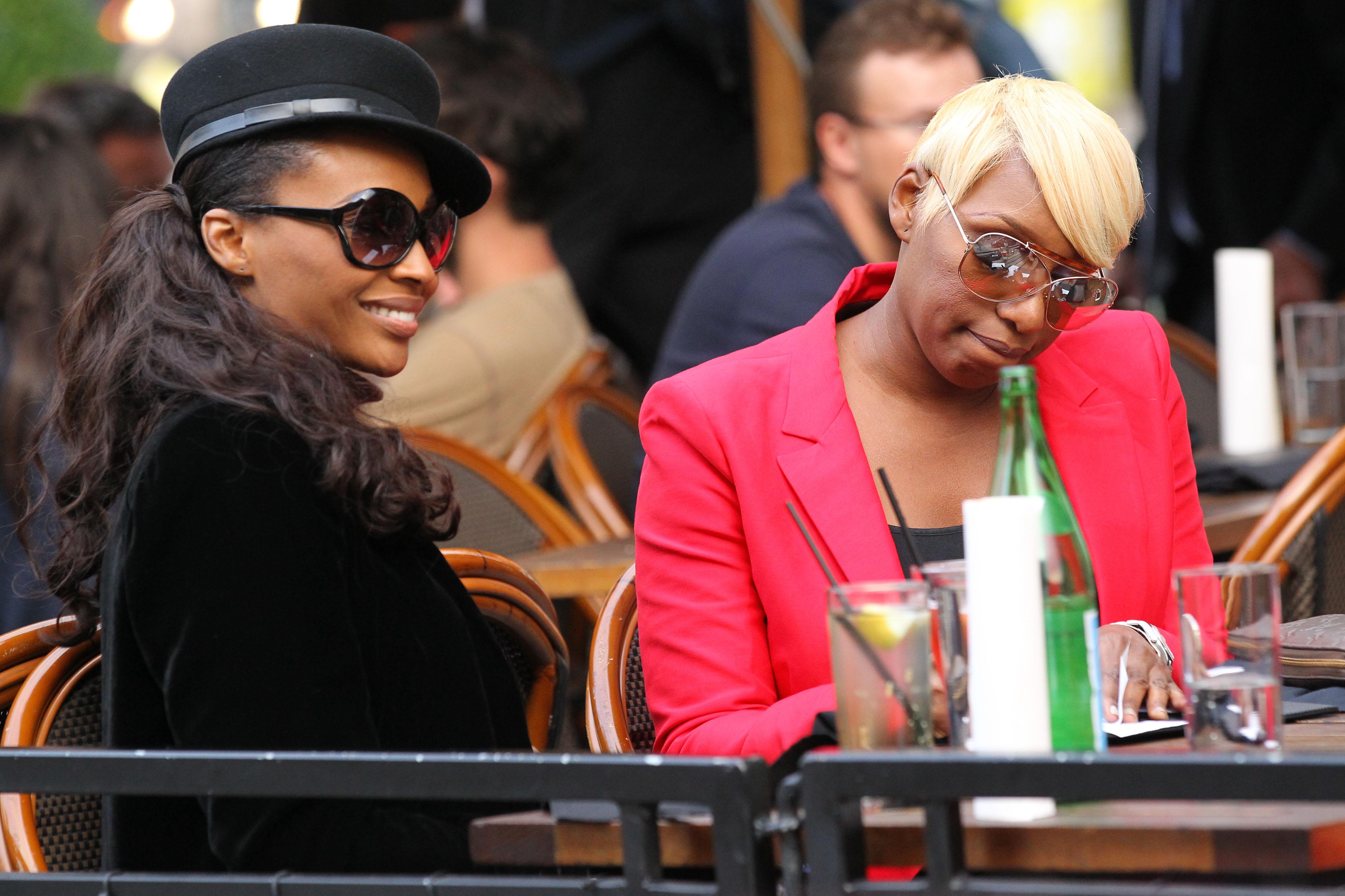 TV personality NeNe Leakes from &#8216;The Real Housewives at Atlanta&#8217; picks up the check at Dos Caminos for her co star Cynthia Bailey in New York City