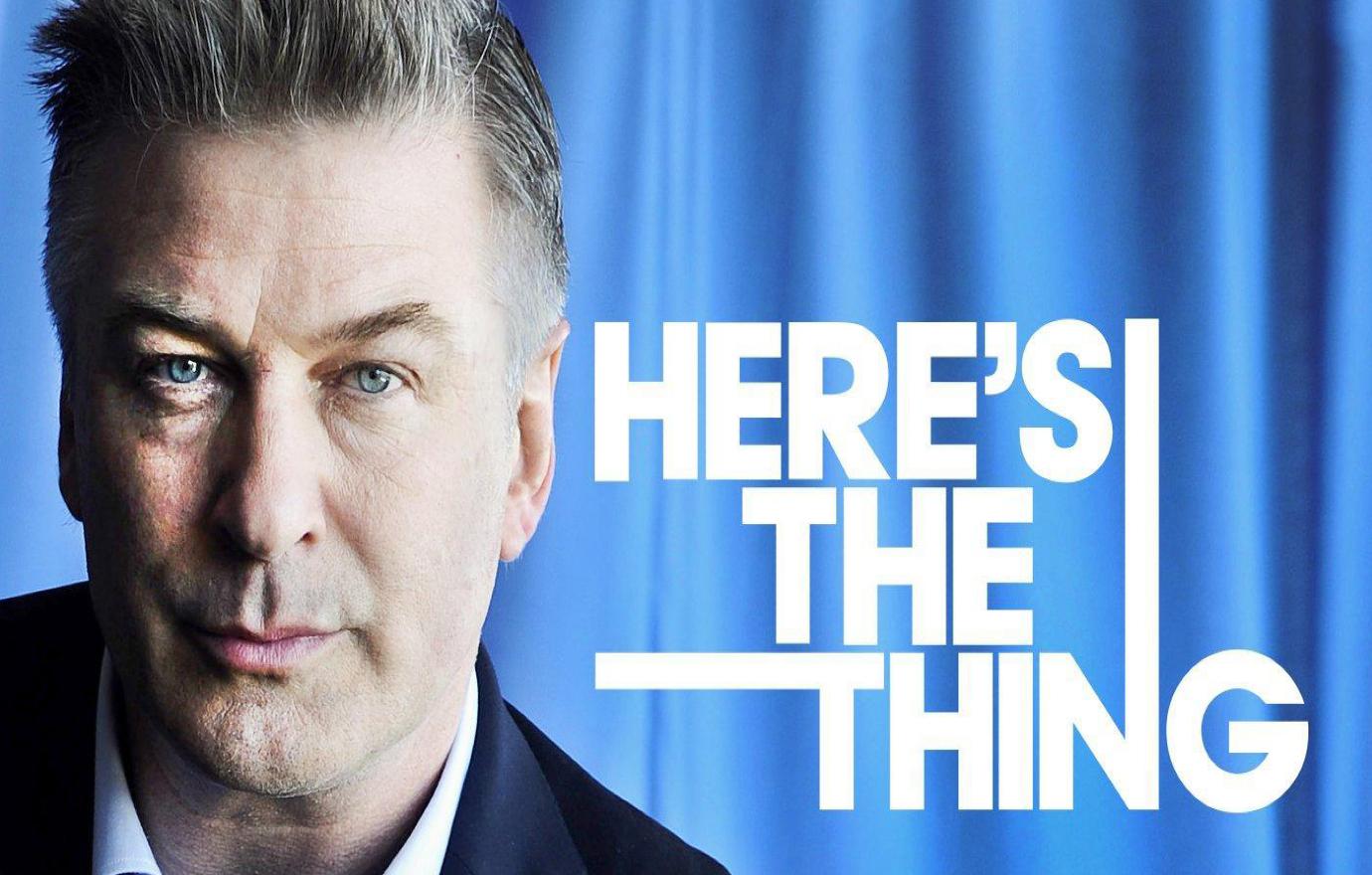 Alec Baldwin, who wore a tie-less navy blue suit, in a promo shot for his podcast.