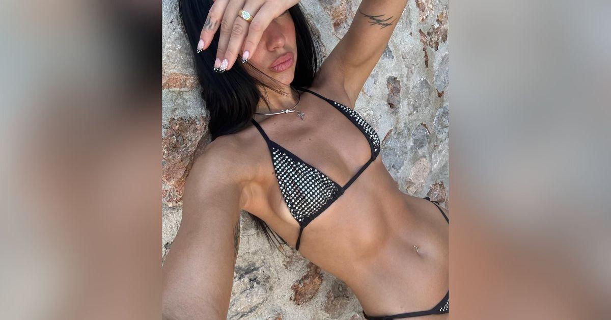 photo of Dua Lipa's abs were the main event during her bedazzled bikini slay session