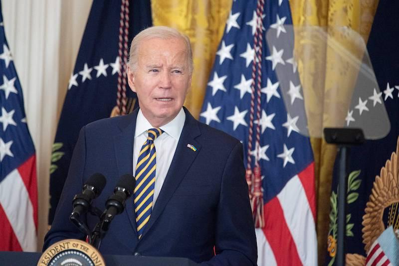 Photo of President Joe Biden at podium.