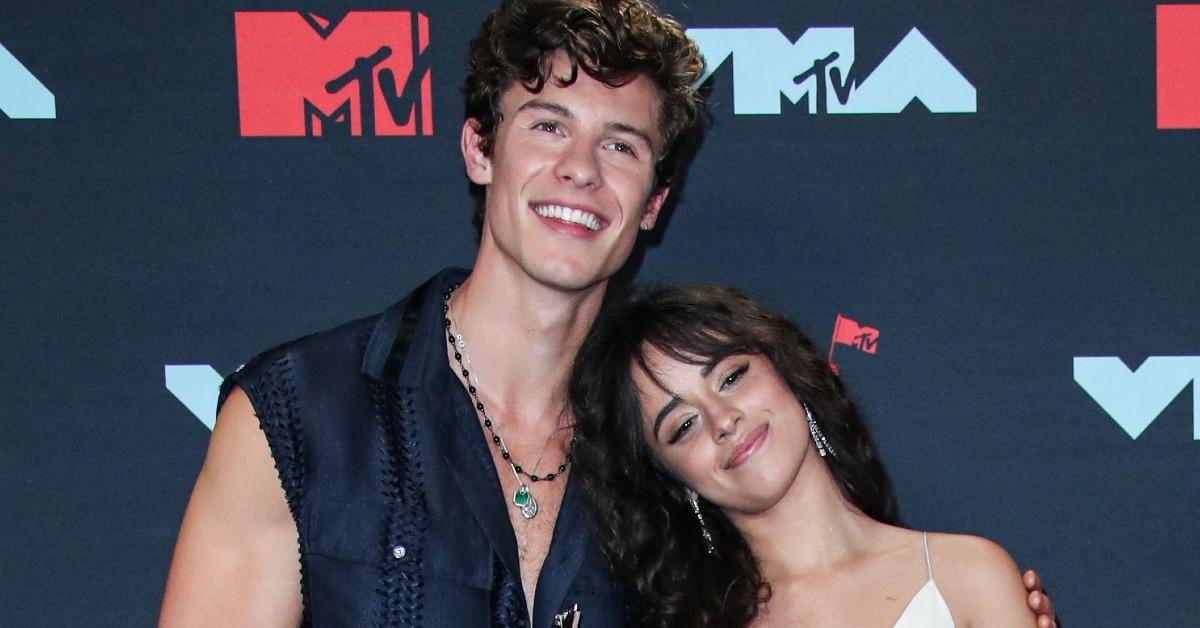 Shawn Mendes Picks Up a Camera While Camila Cabello Waits in the