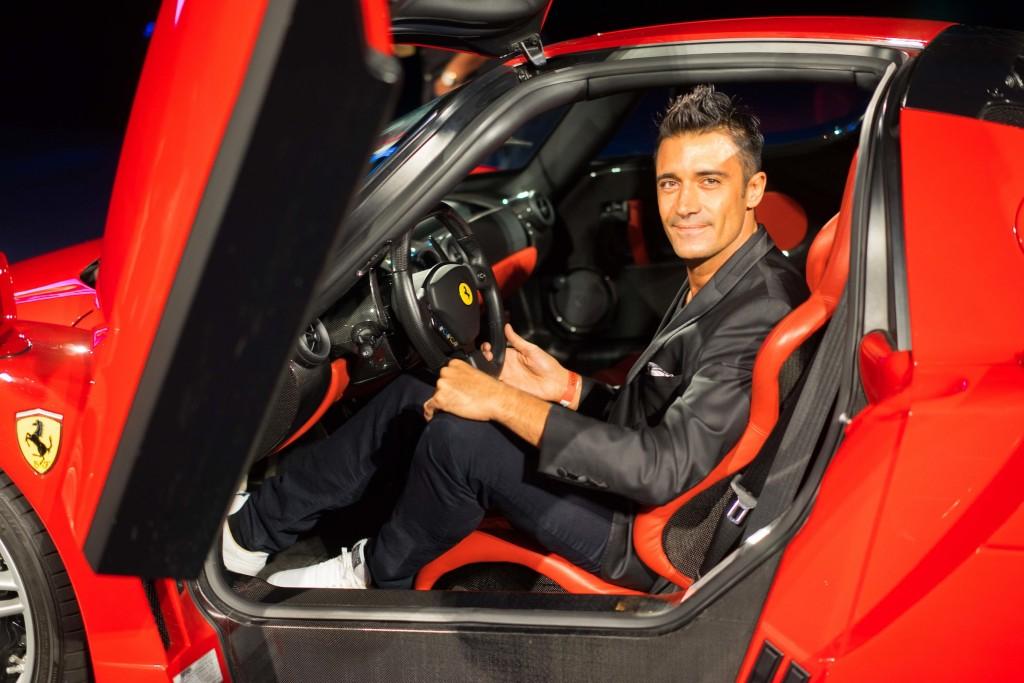 Gilles Marini checks out the 2004 Ferrari Enzo at the Auctions America California sale taking place July 17th and 18th at Santa Monica Barker Ha