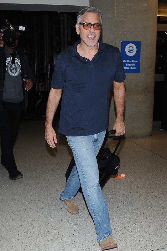 A casual George Clooney departs LAX