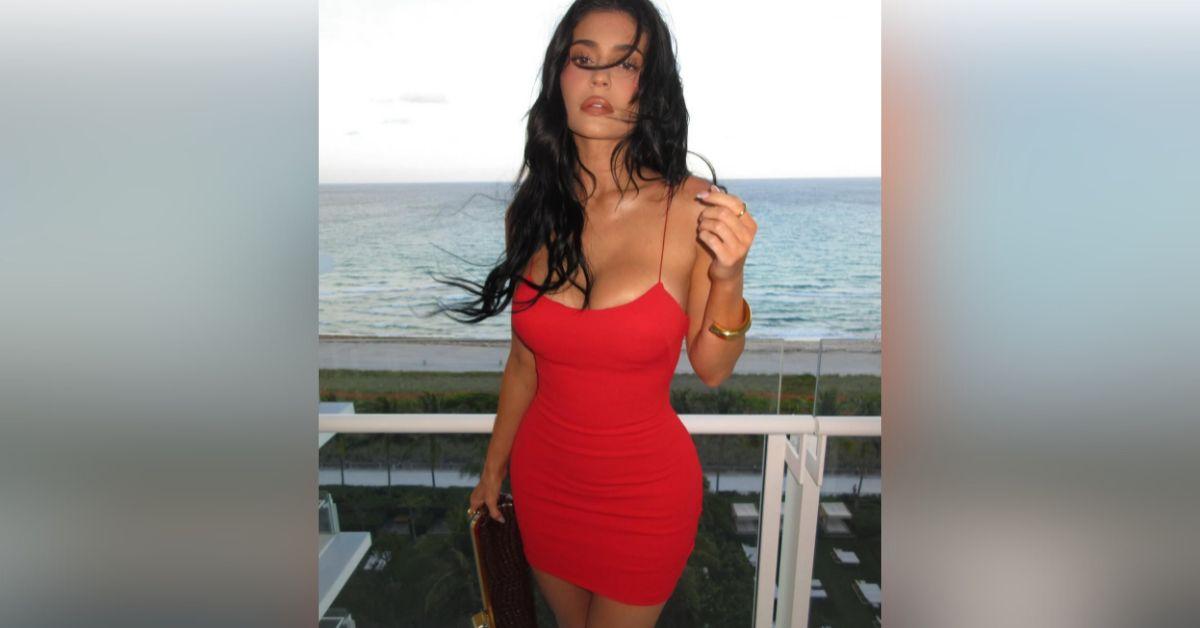 kylie jenner spills out red mini dress girls night hailey bieber photos