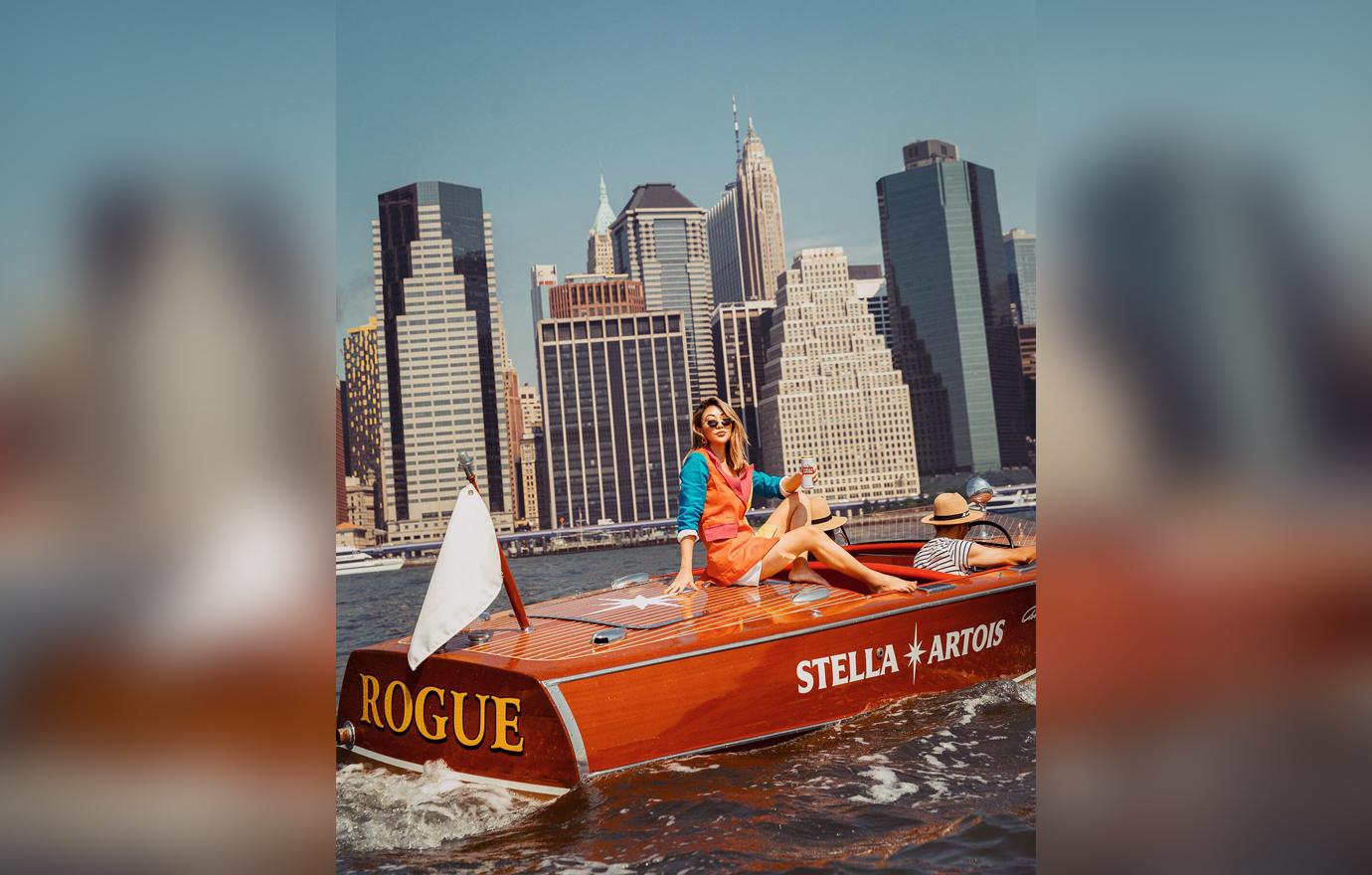 Influencer Jessica Wang spotted channeling European vacation vibes on the East River aboard Stella Artois’ Riva-style boat