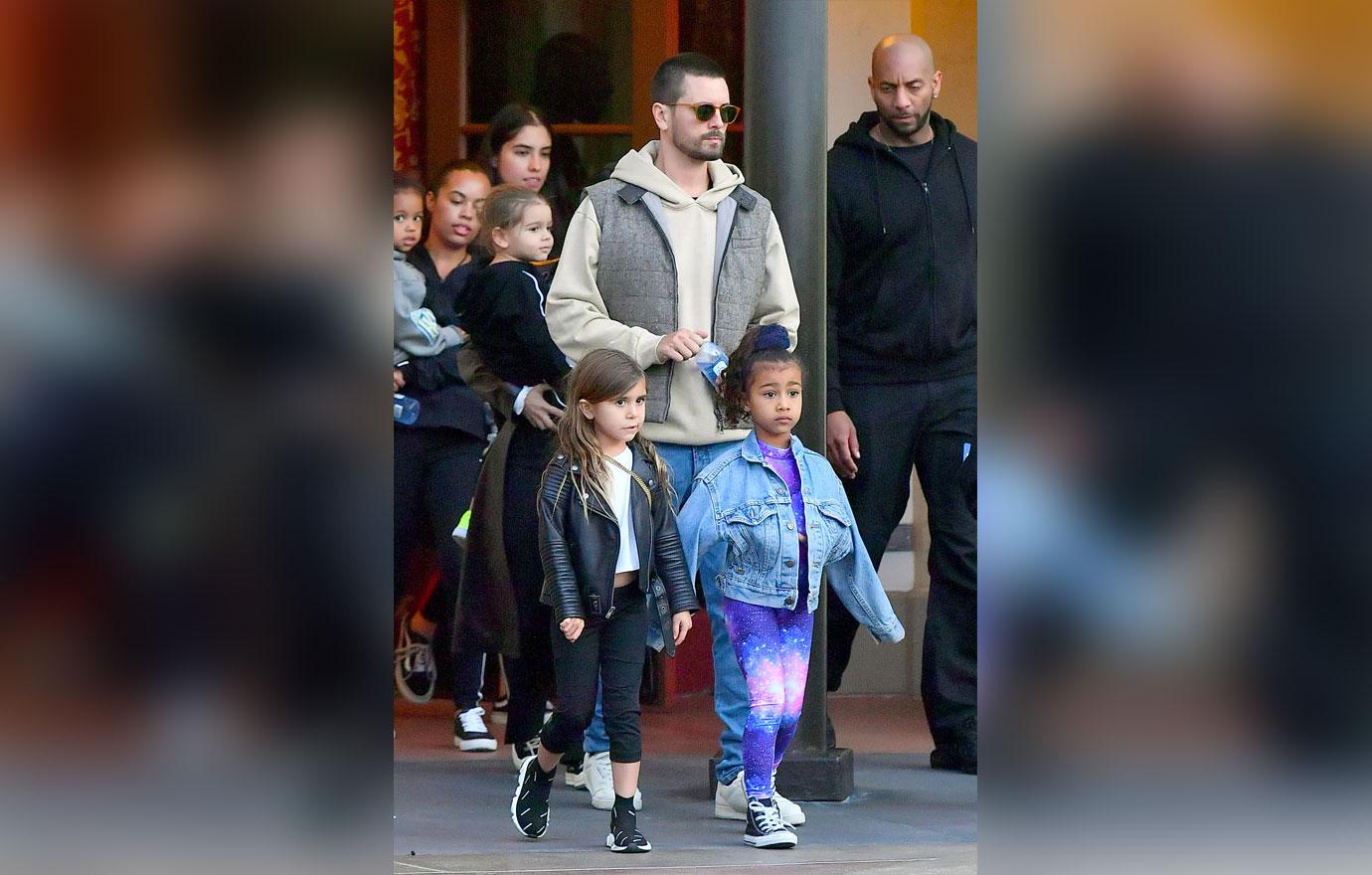 ** PREMIUM EXCLUSIVE RATES APPLY** Kourtney Kardashian and Scott Disick set their differences aside for a fun day at Universal Studios with their kids