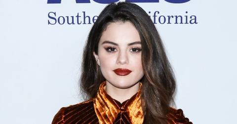 Selena Gomez Wearing a Yellow Dress With Red Lipstick on Red Carpet