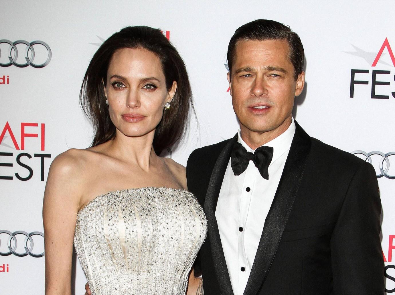 angelina jolie helps domestic violence law passed brad pitt abuse allegations