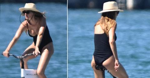 gisele bundchen shows off her post pregnancy body while riding water bikes with her boyfriend joaquim valente in miami pp