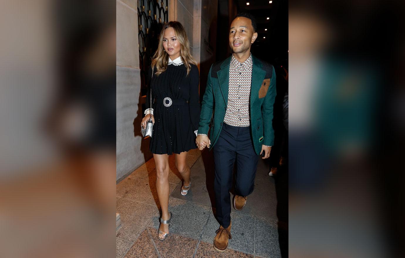 John Legend and his wife Chrissy Teigen leave their hotel in Paris