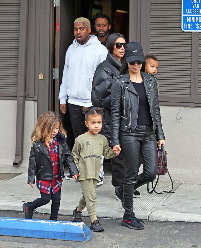 Kardashian sisters Kim and Kourtney join Kanye West and the kids for dinner