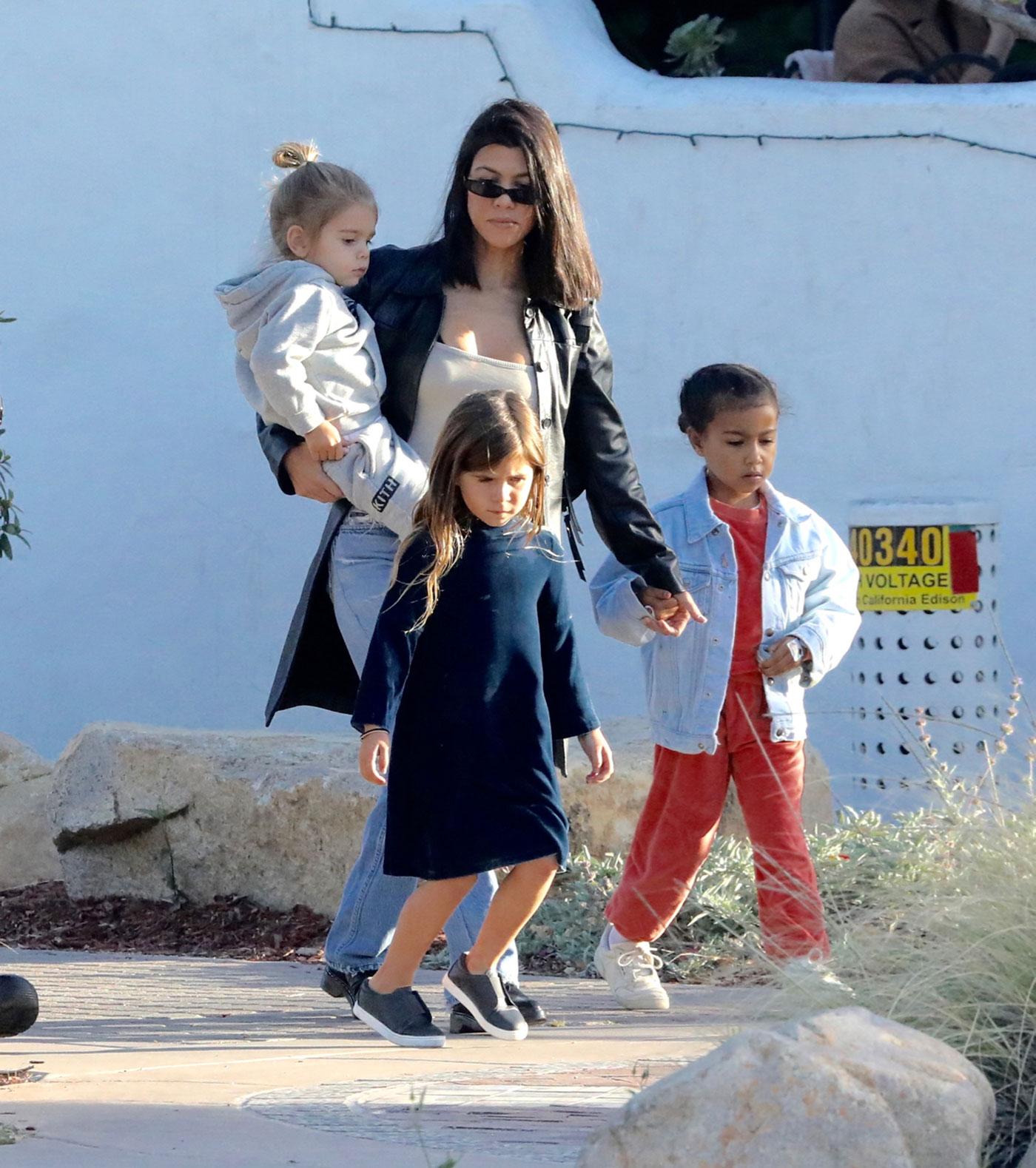 Kourtney Kardashian seen at a restaurant in Malibu with her kids and her nieces.