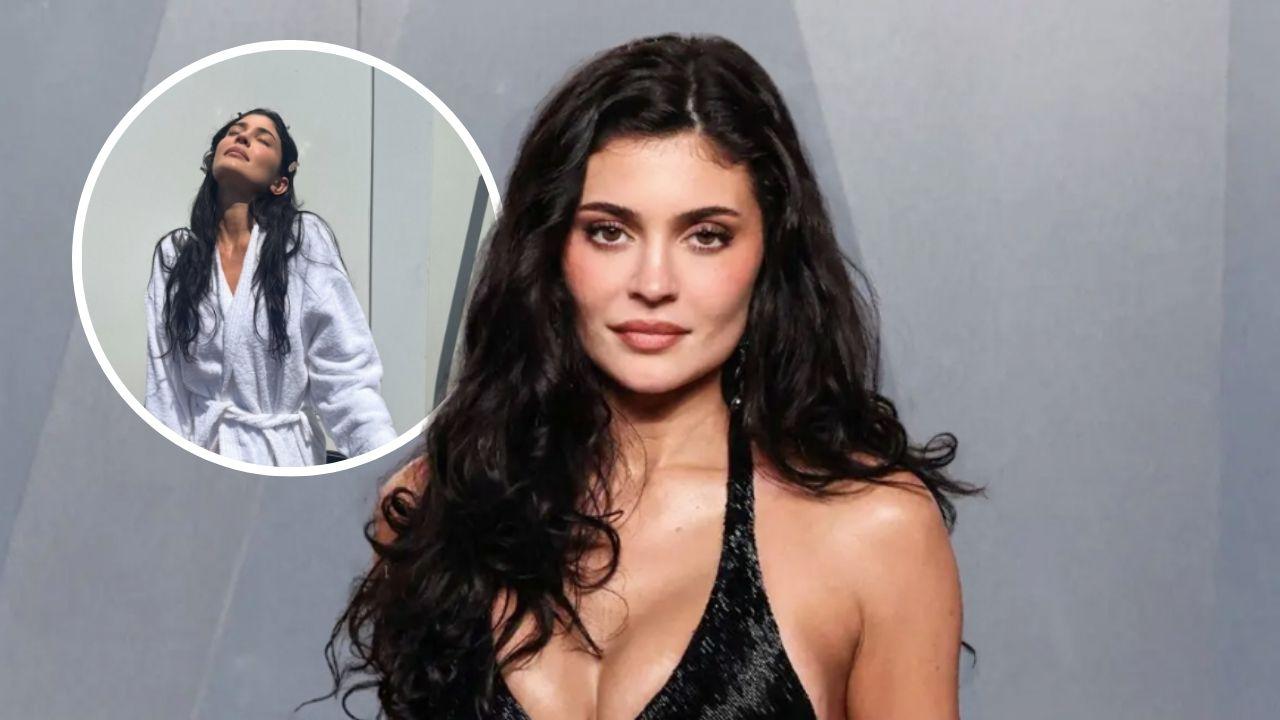 Image of Kylie Jenner posed outside in nothing but her robe.