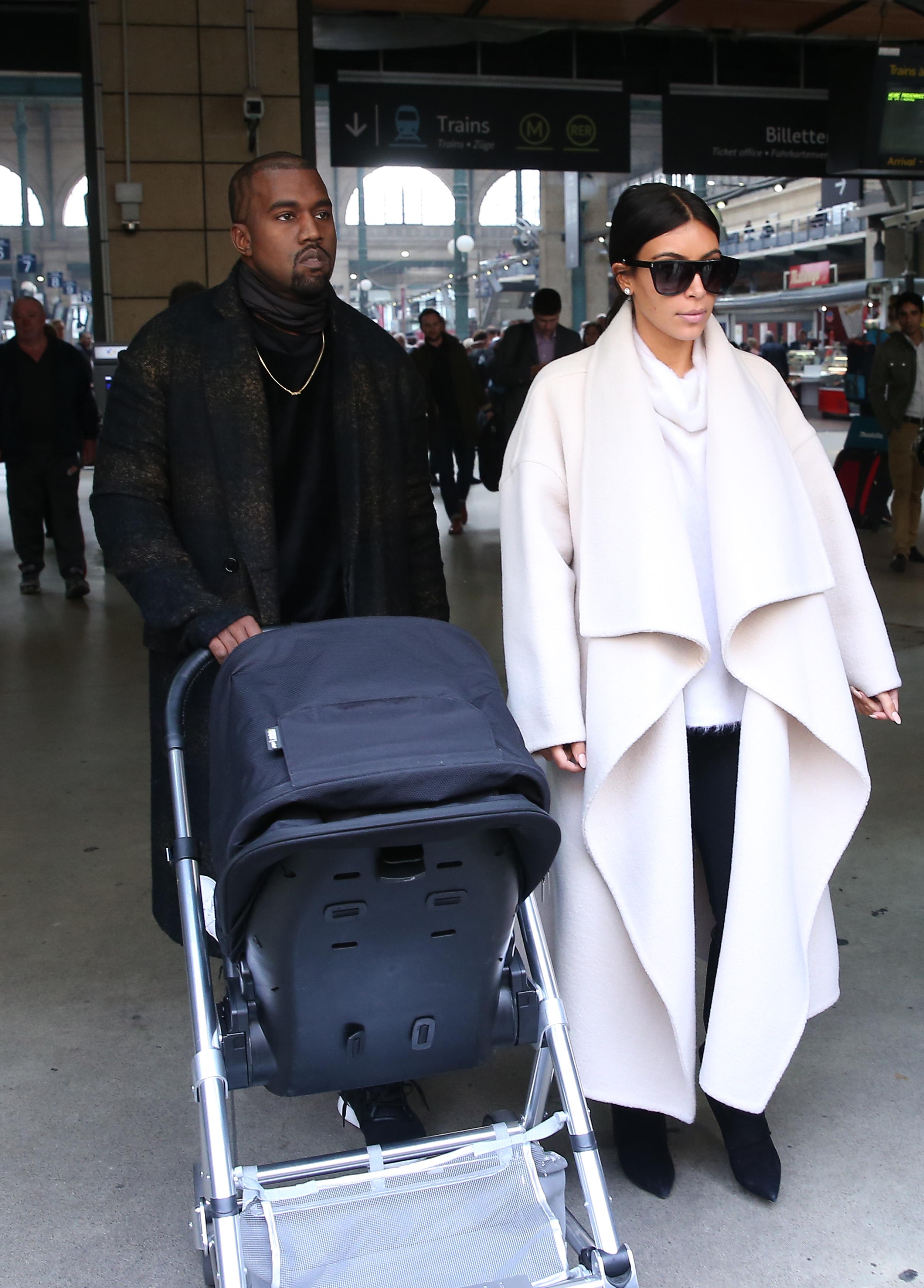 Kim Kardashian, Kanye West and North West arrive in Paris to attend the Paris Fashion Week