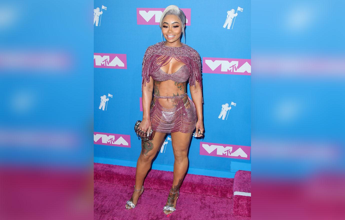 Blac Chyna wearing a Laurel DeWitt see through pink chain outfit arrives at the 2018 MTV Video Music Awards