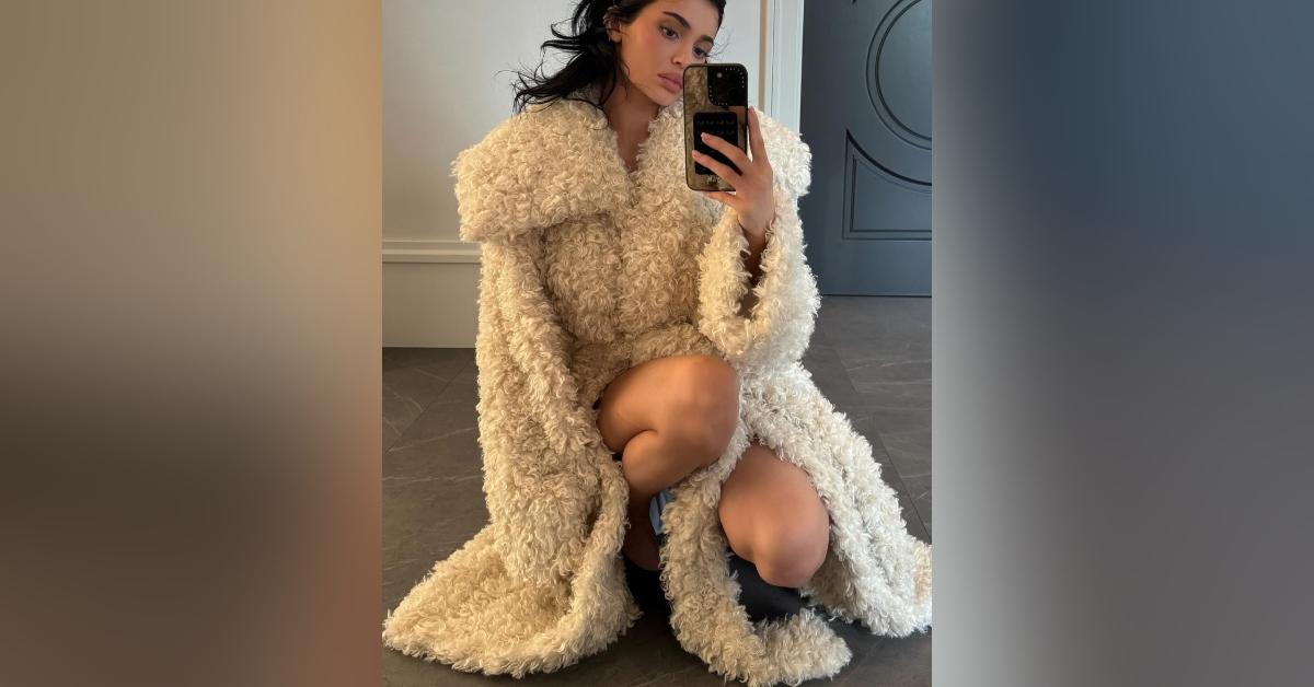 kylie jenner ditches pants shows legs coat khy clothing collection photos