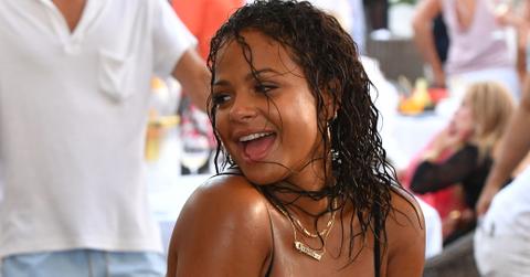 Bikini clad Christina Milian goes wild as she parties at Bagatelle Beach in St. Tropez with friends.