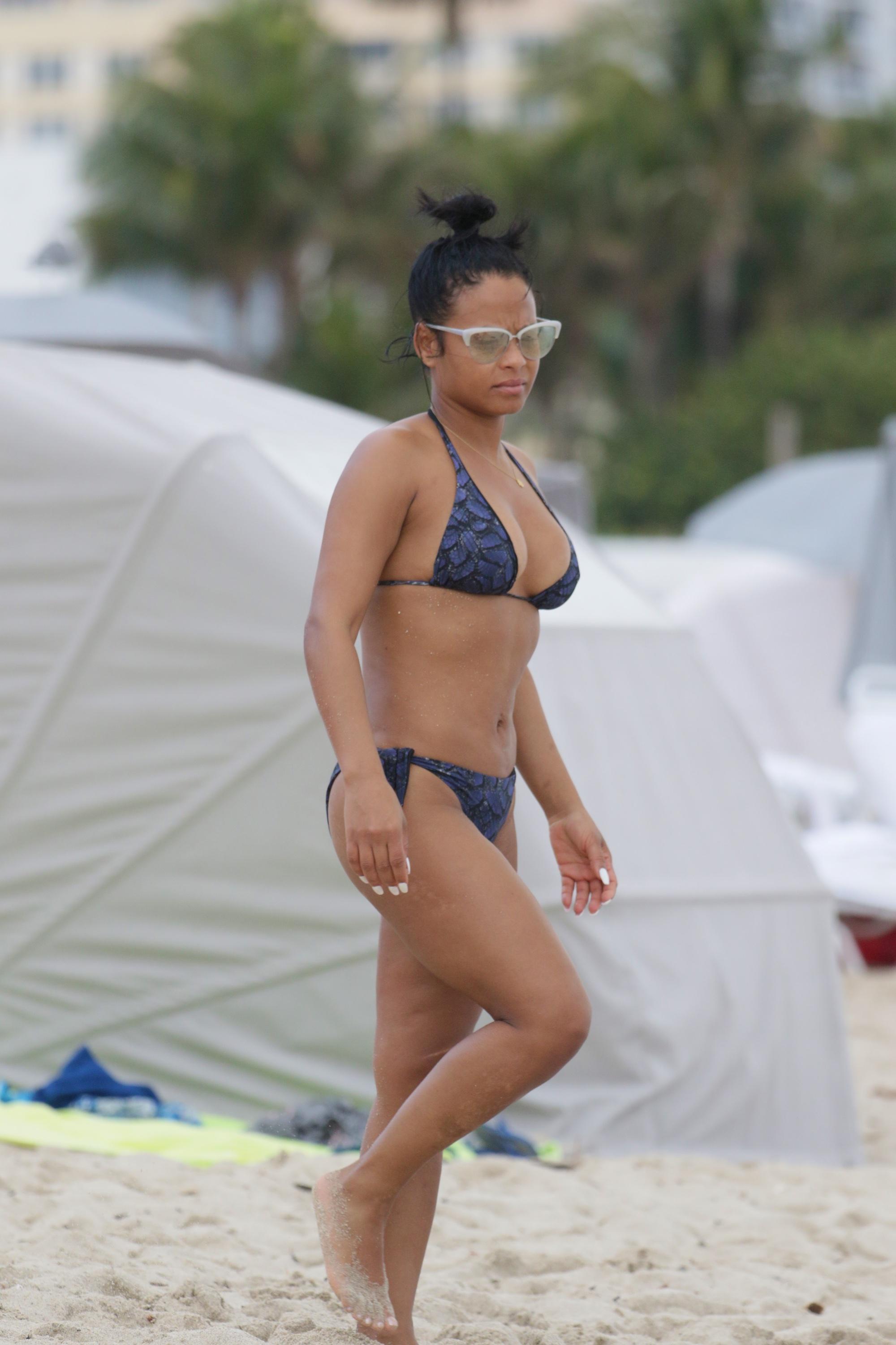 Christina Milian enjoying of some sun in a bikini at the beach in Miami