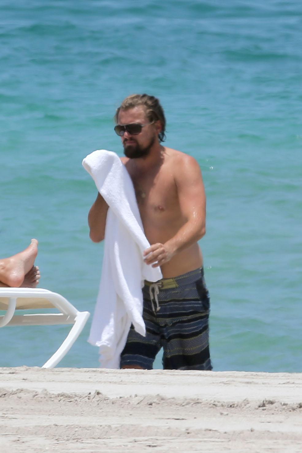 Leonardo DiCaprio sports long hair and a beard at the Beach Miami, FL