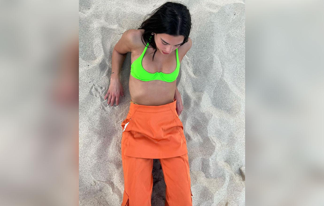 dua lipa stuns lime green bikini split boyfriend anwar hadid