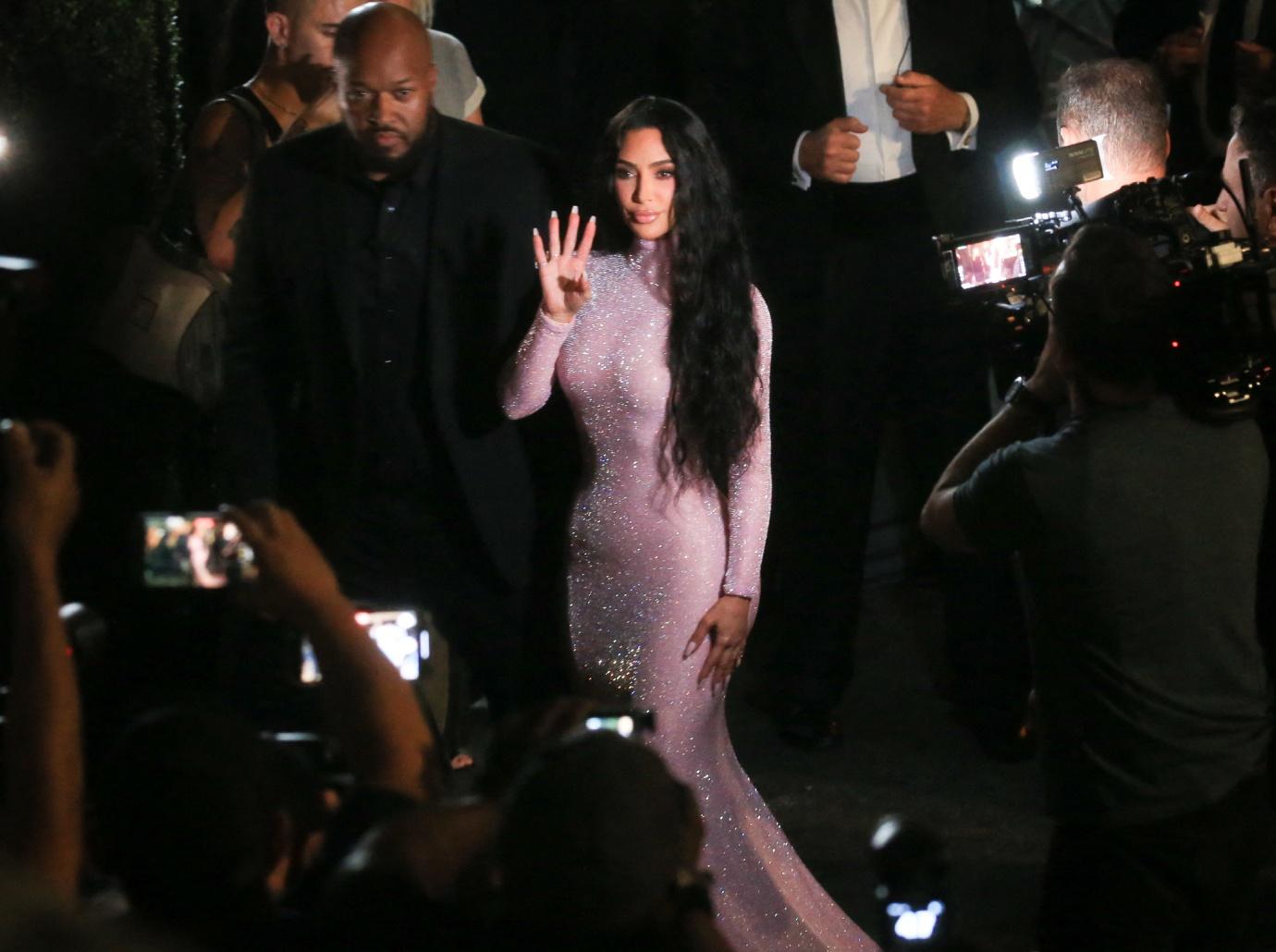 Kim Kardashian stuns in pink as she leaves a SKIMS photoshoot and