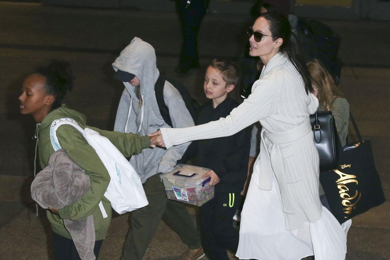 Angelina Jolie & Her Six Children Arrive Back In Los Angeles