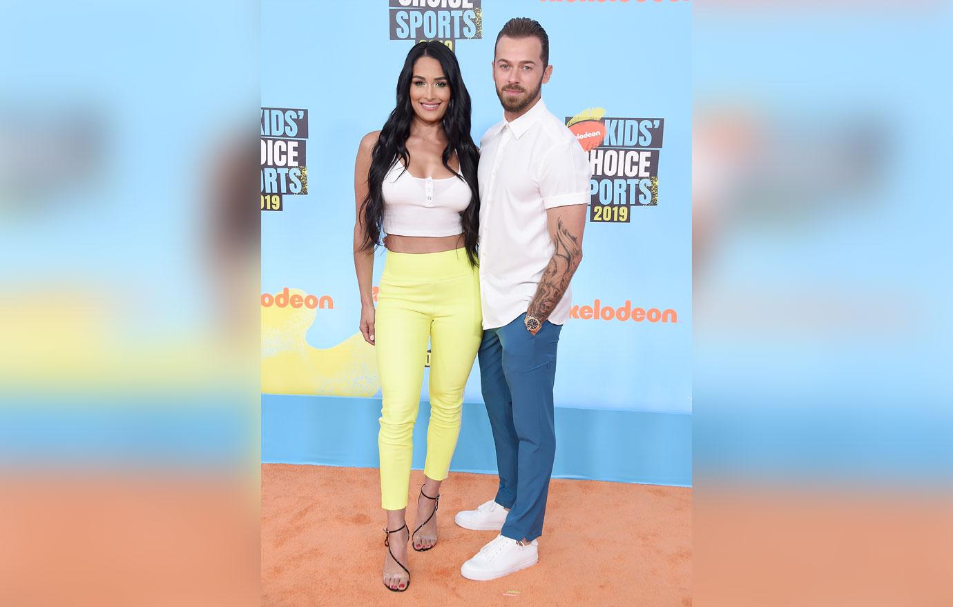 Nikki Bella & Artem Chigvintsev Look Smitten Leaving A Party In LA