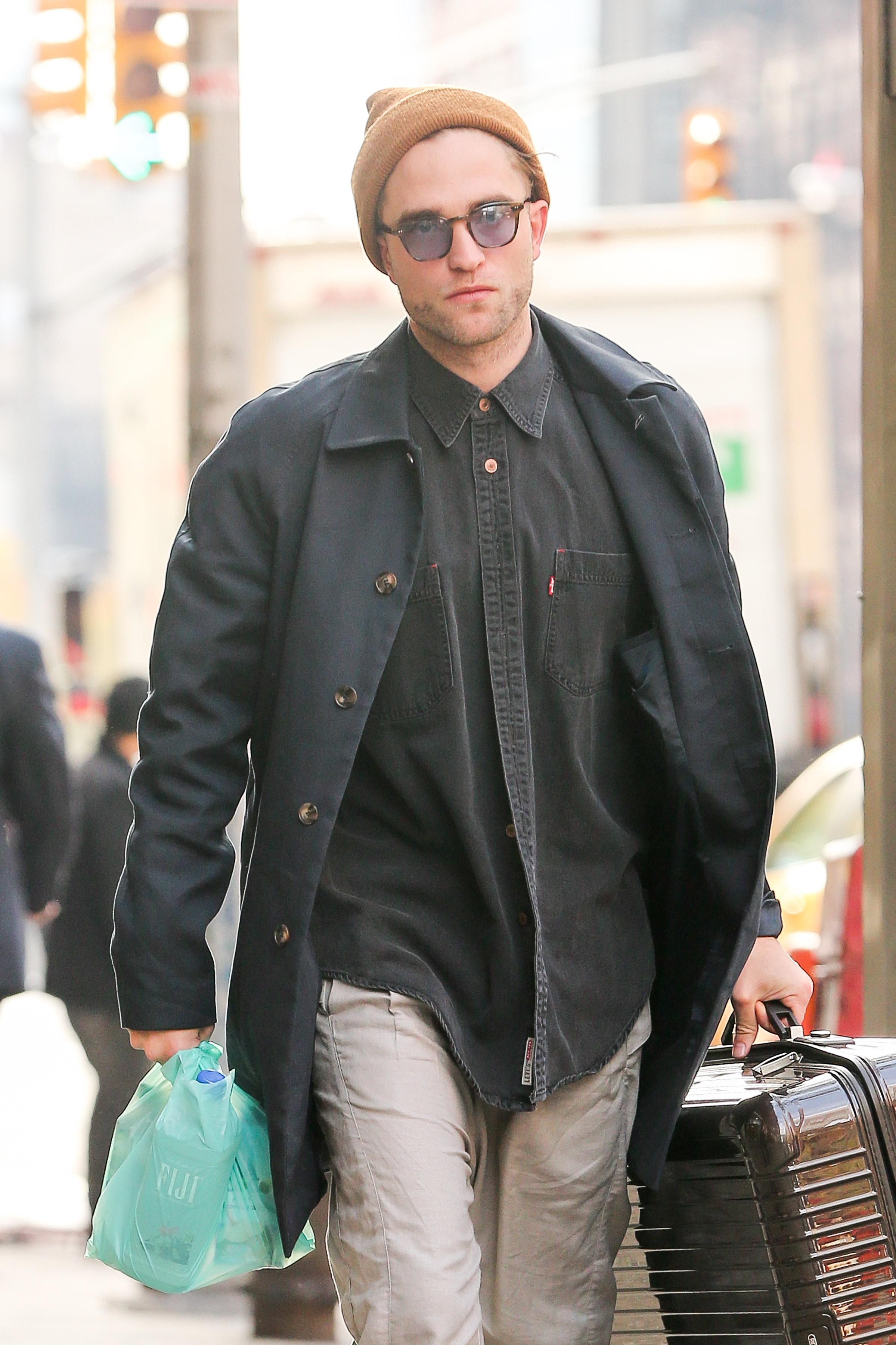 Robert Pattinson spotted strolling with his luggage in New York City