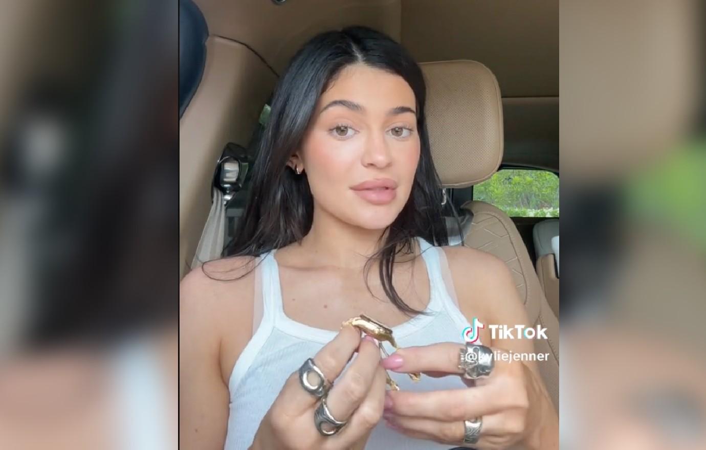 Kylie Jenner slammed for 'ridiculous' lips as star busts out of black bra  in sexy TikTok video