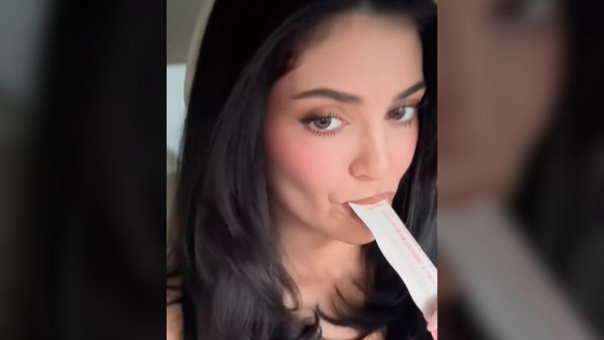 Image of Kylie Jenner snacked on Cutting Jelly while getting dressed up.