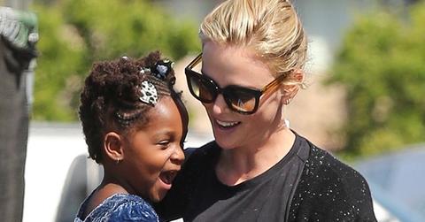 Charlize theron says adoption lowest point elle interview