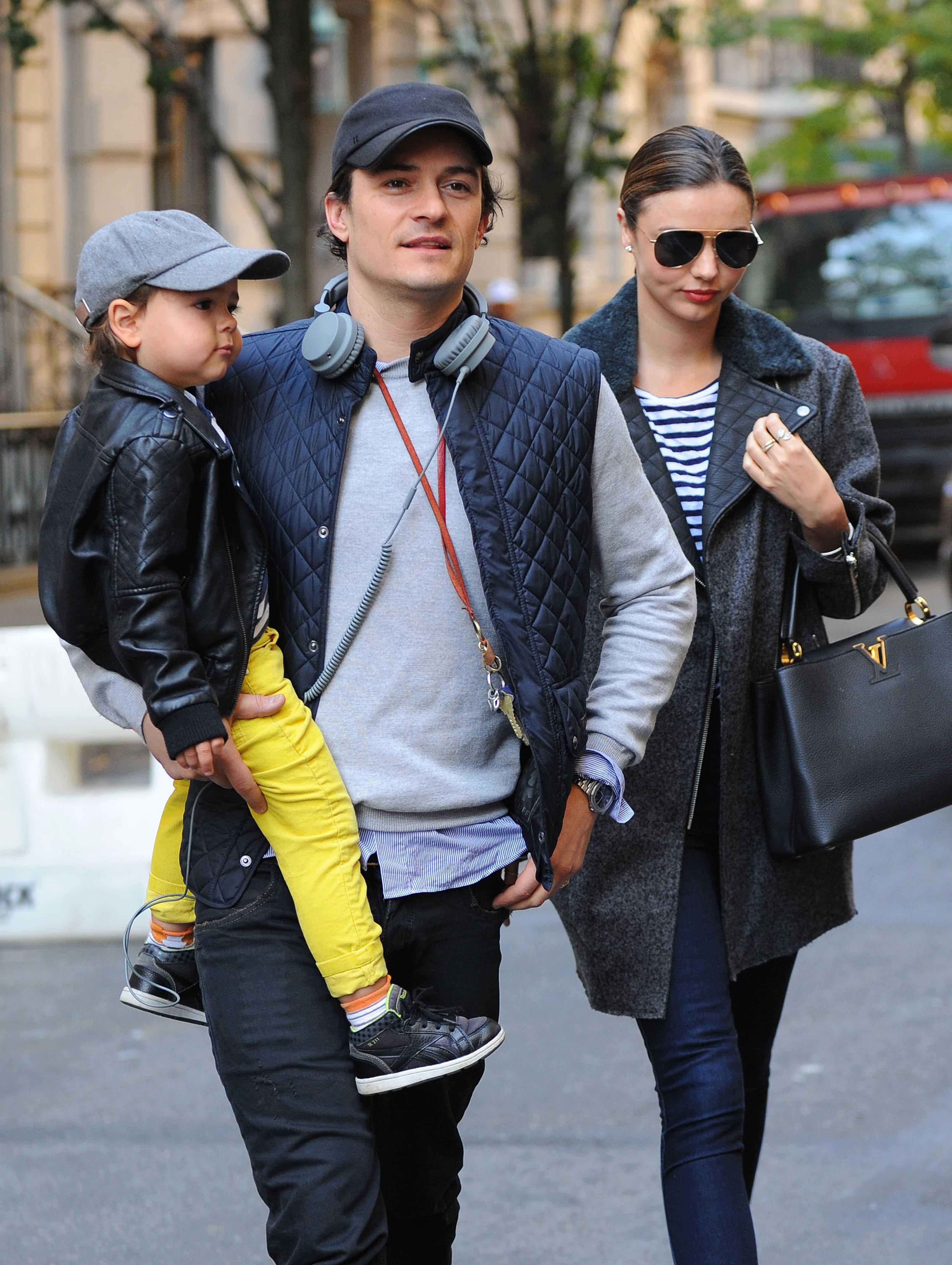 Orlando Bloom and Miranda Kerr take Flynn for a walk in New York