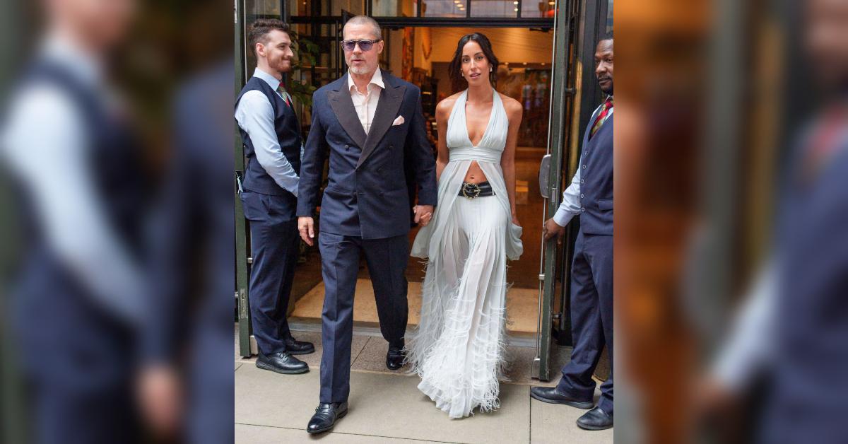 brad pitt ines de ramon hold hands red carpet f premiere nyc photos