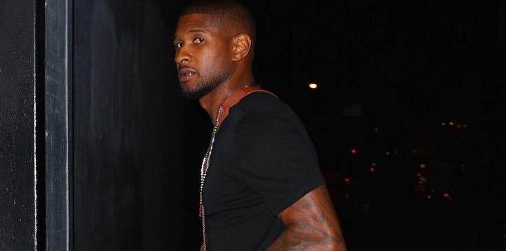 Usher steps out without his wedding ring