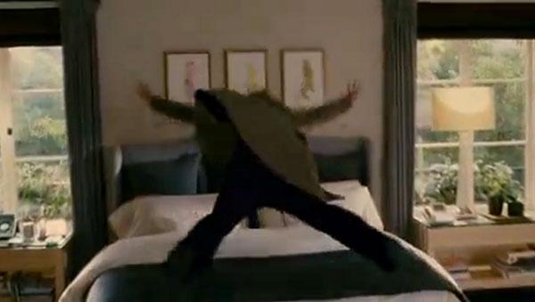 Kate jumps on the bed