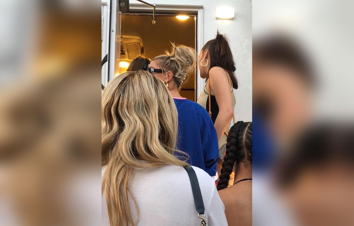 *EXCLUSIVE* Bella Hadid and Hailey Baldwin wait in line for the restroom