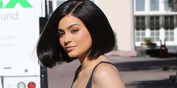 Faking It! Kylie Jenner Showcases Her Spanx While In A Skintight Dress!